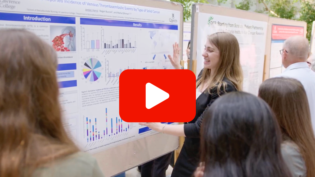 A gathering of people looking at reasearch posters